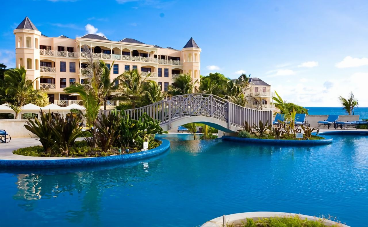 Poinciana Luxe Escapes exterior with tropical landscaping at The Crane Resort, Barbados