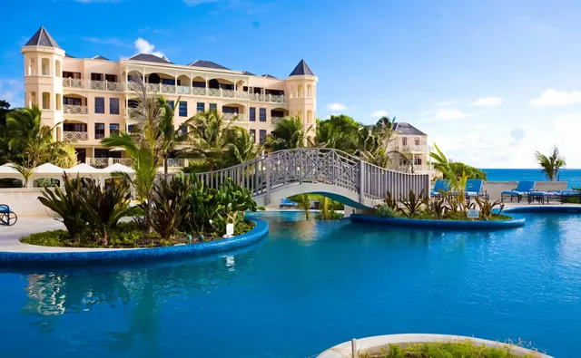 Poinciana Luxe Escapes exterior with tropical landscaping at The Crane Resort, Barbados